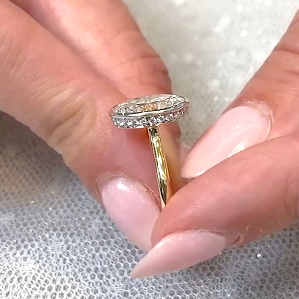 3.85Ctw Oval Moissanite Bezel Hidden Halo Engagement Ring In 14K Two-Tone Gold