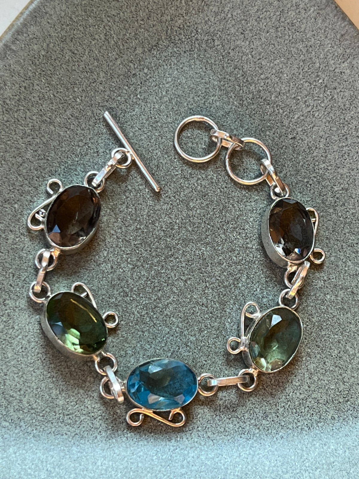 Brown Green & Blue Oval Faceted Glass in Nonmagnetic Silver Frame LInk Bracelet