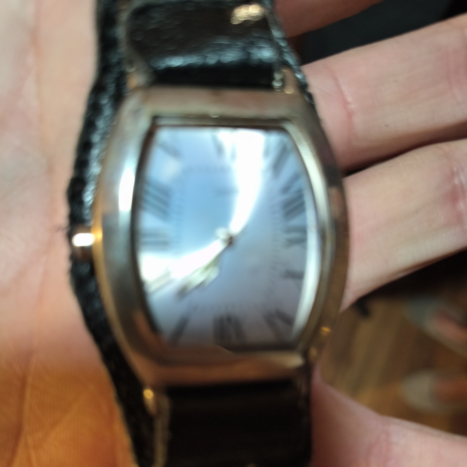 Silver Tonneau Quartz Wristwatch Roman Numerals Black Leather Strap Analog