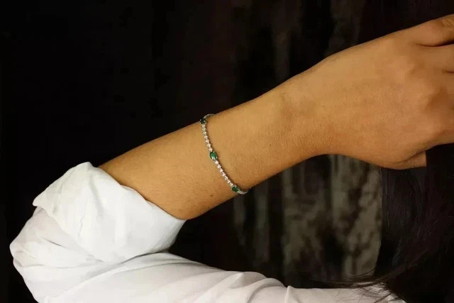9TCW Oval Lab Created Emerald & Diamond Tennis Bracelet 14K White Gold Plated