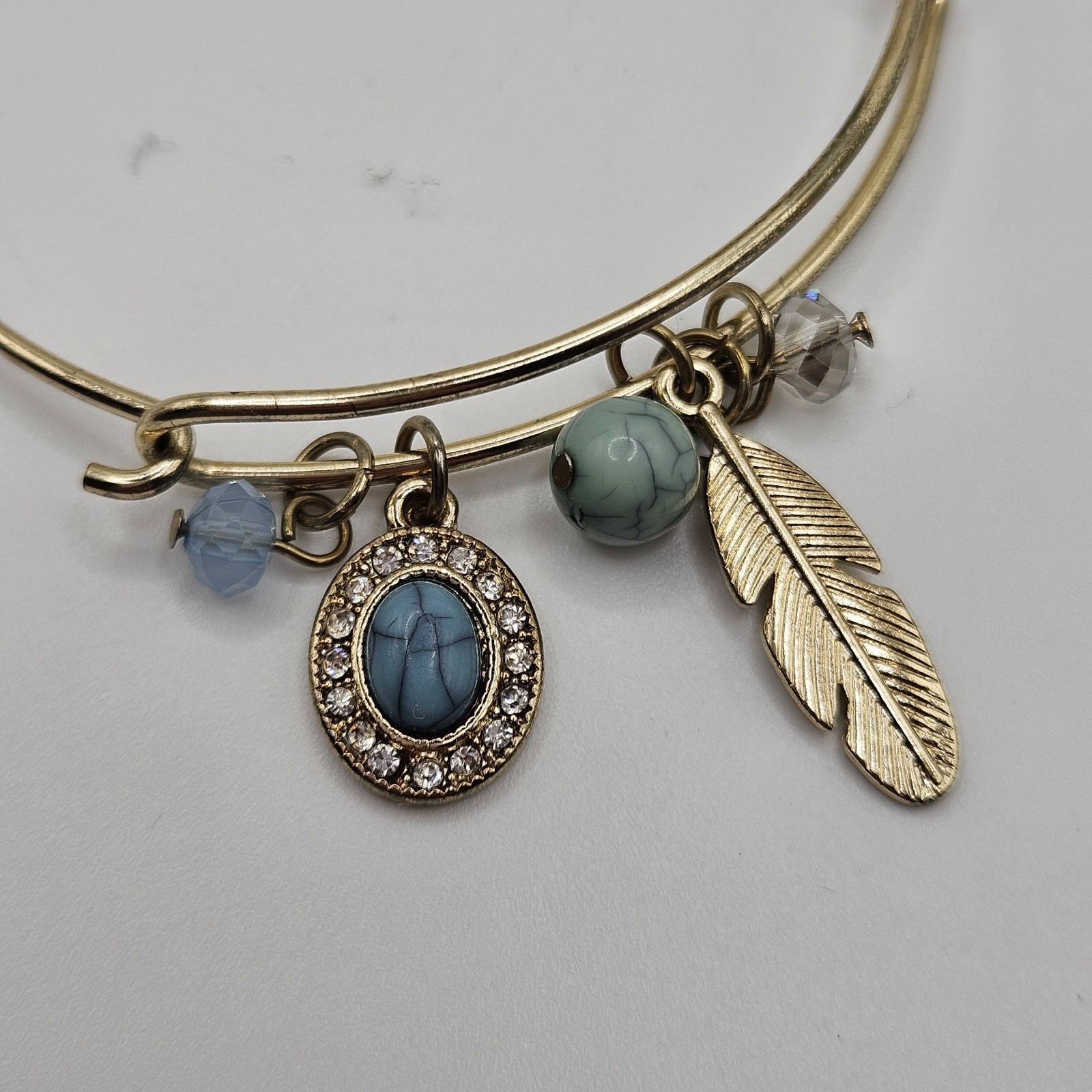 Feather And Faux Torquoise Silver Tone Rhinestone Bangle Charm Bracelet