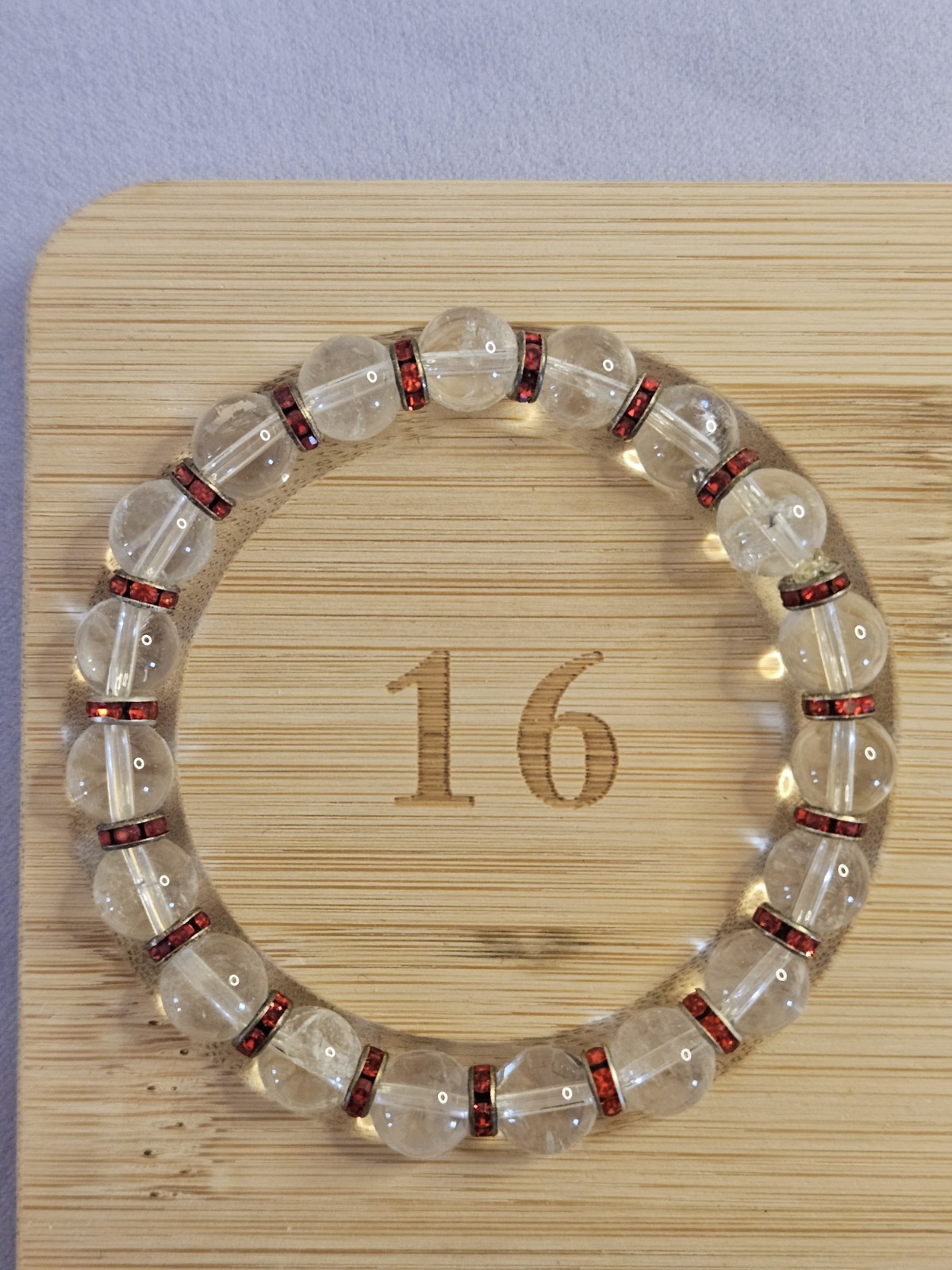 Crystal Clear Quartz Round Beaded Stretch Bracelet w Red Rhinestone Spacer Rings
