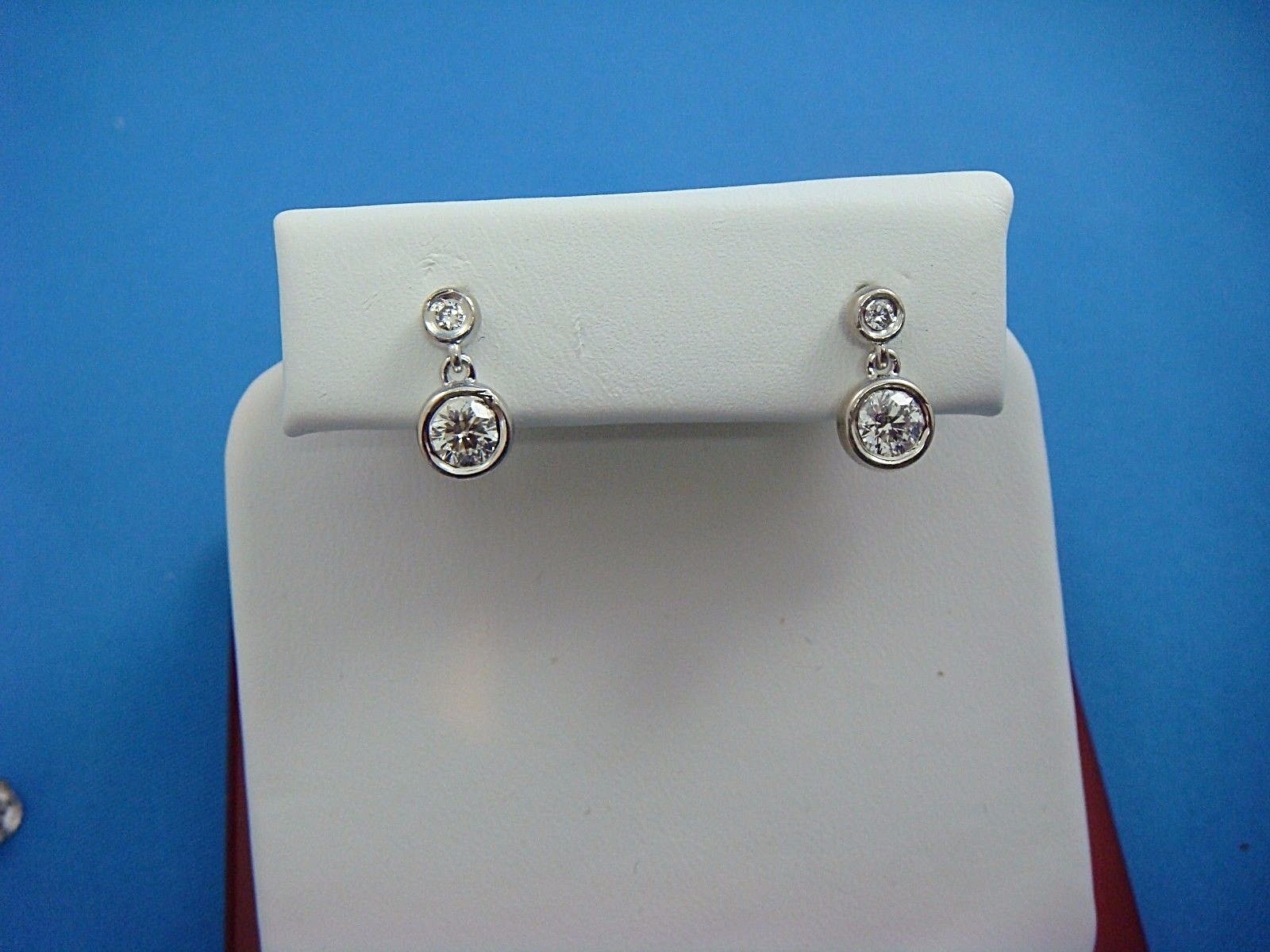0.90 CT “DIAMONDS BY THE YARD” DOUBLE BEZEL 14K WHITE GOLD EARRINGS, 2.6 GRAMS