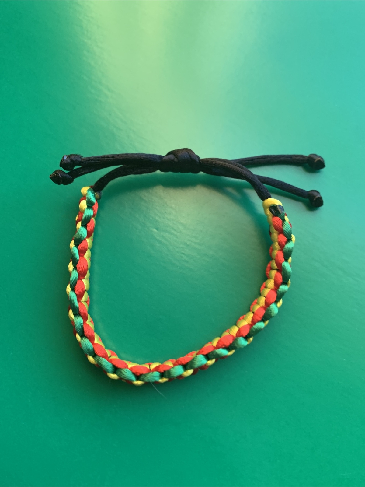 GUYANA Bracelet RED BLACK YELLOW GREEN Satin Rattail Cord Shamballa Nylon