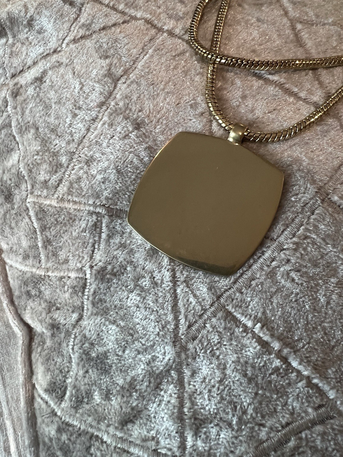 Kenneth Cole Necklace Double Serpent Chain Sporting A Large Gold Square Pendant