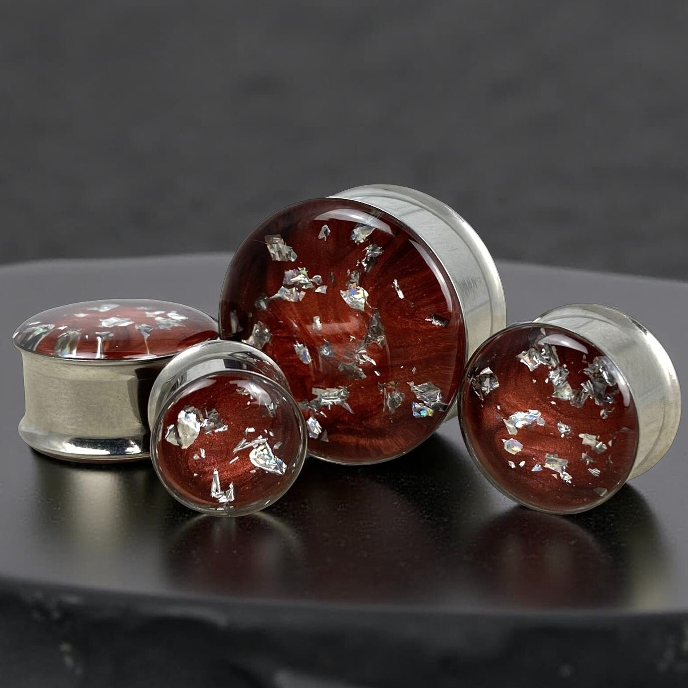 Stainless Steel Plugs with Embedded Red Pearlescent Resin Silver Flakes gauges