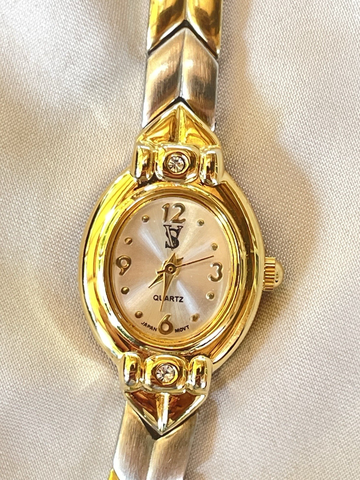 Vintage Sergio Valente Women’s Oval Quartz Analog Wristwatch Two-Tone Gold Dial