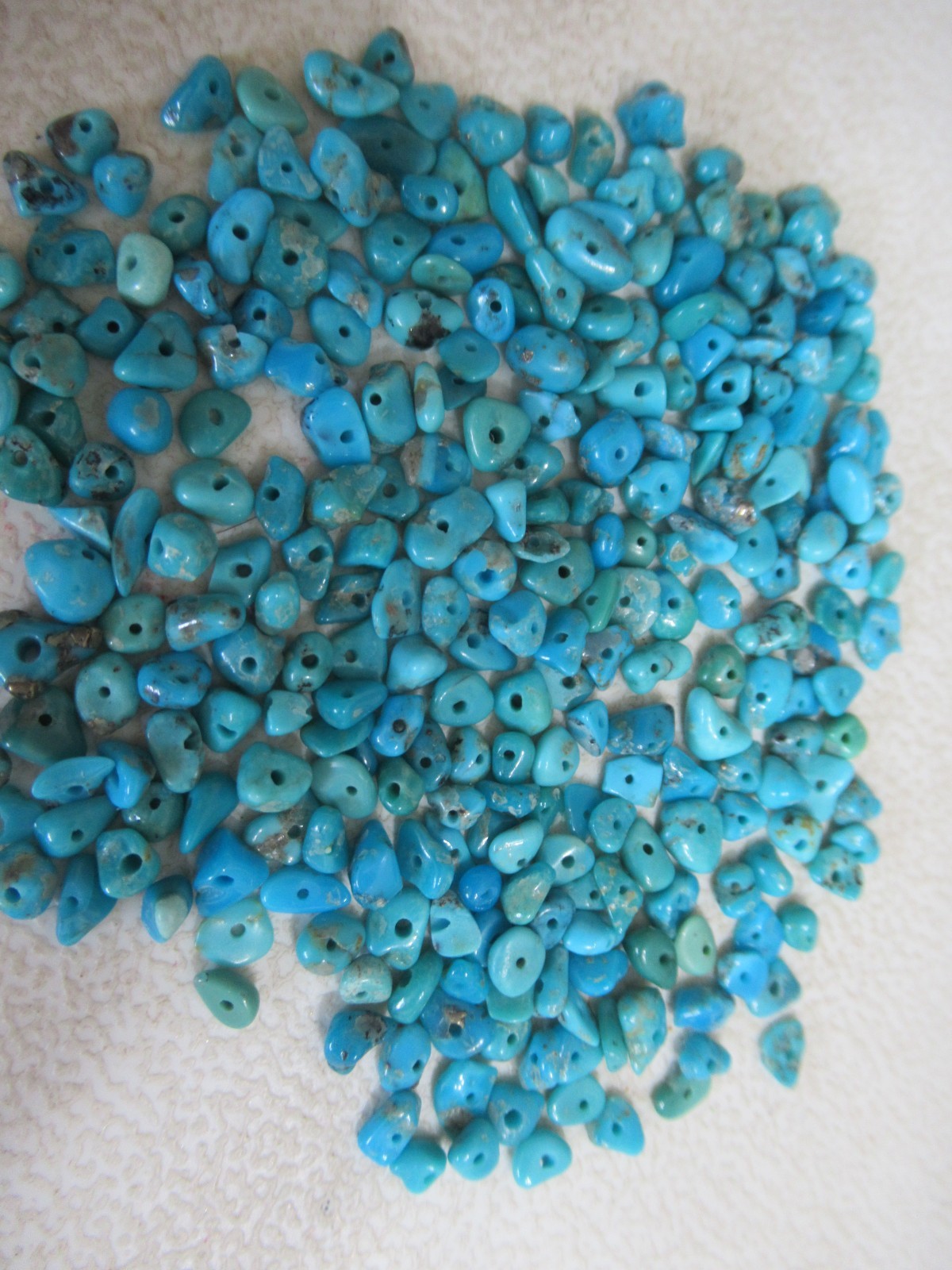 SLEEPING BEAUTY TURQUOISE 1/2 OZ SMALL DRILLED NUGGETS 3X2mm TO 6X4mm #765