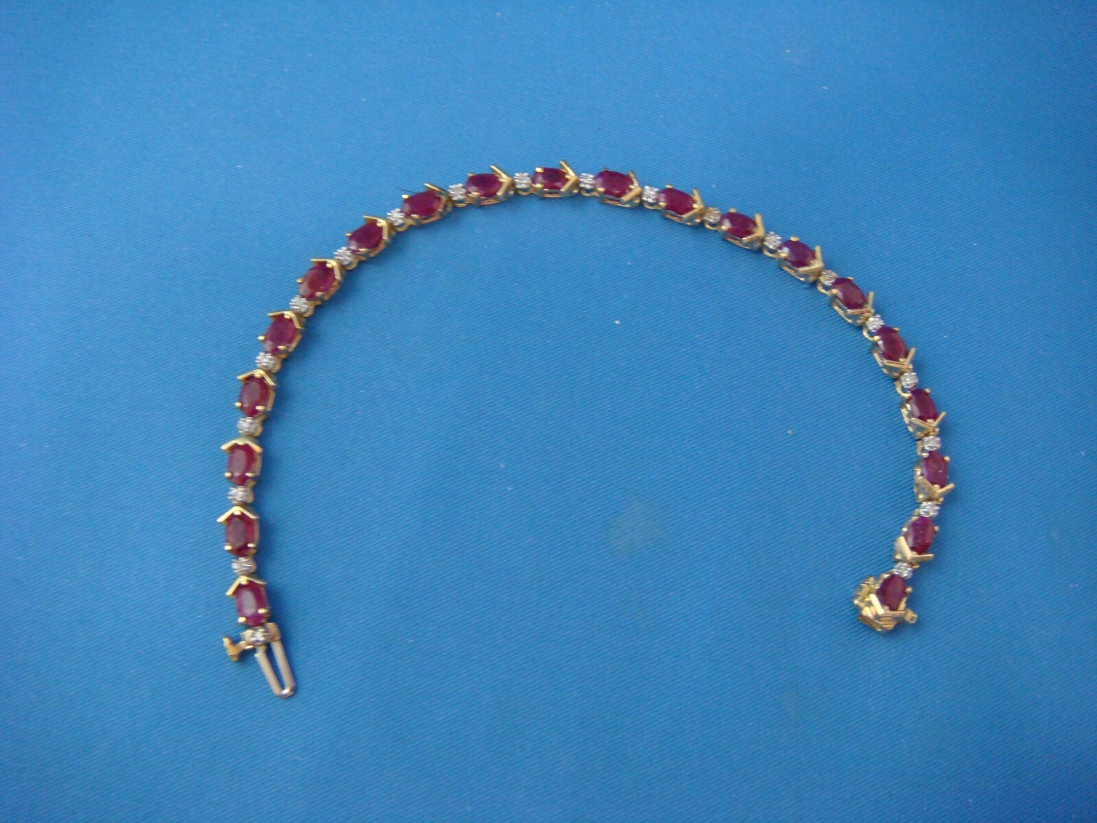 14 KT YELLOW GOLD GENUINE RUBY AND DIAMONDS TENNIS BRACELET 8.8 GRAMS 6.5 “