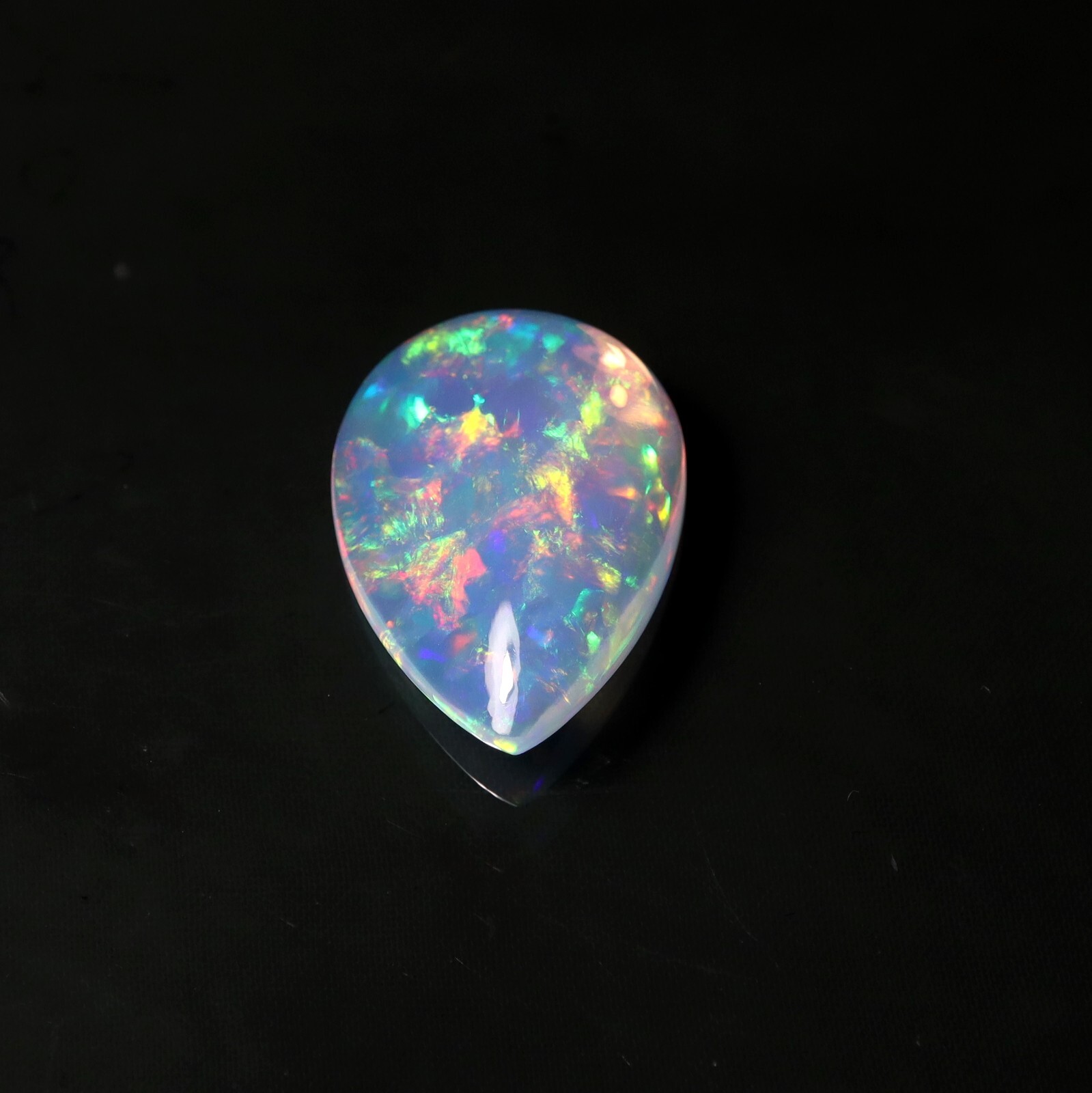 9 Carat 21.9×15.9 MM Natural AAAA Rainbow Fire Ethiopian Welo Opal Pear Shape