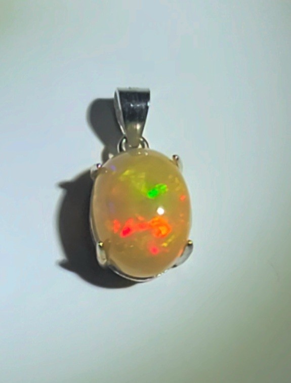 Ethiopian Honey Hue Fire Opal Natural 10X8/925 Sterling Silver (SEE DETAILS)