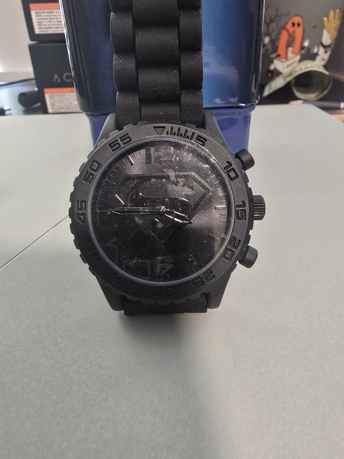 Accutime Superman Men’s Quartz Analog Black Dial Silicone Strap w/ Tin Box