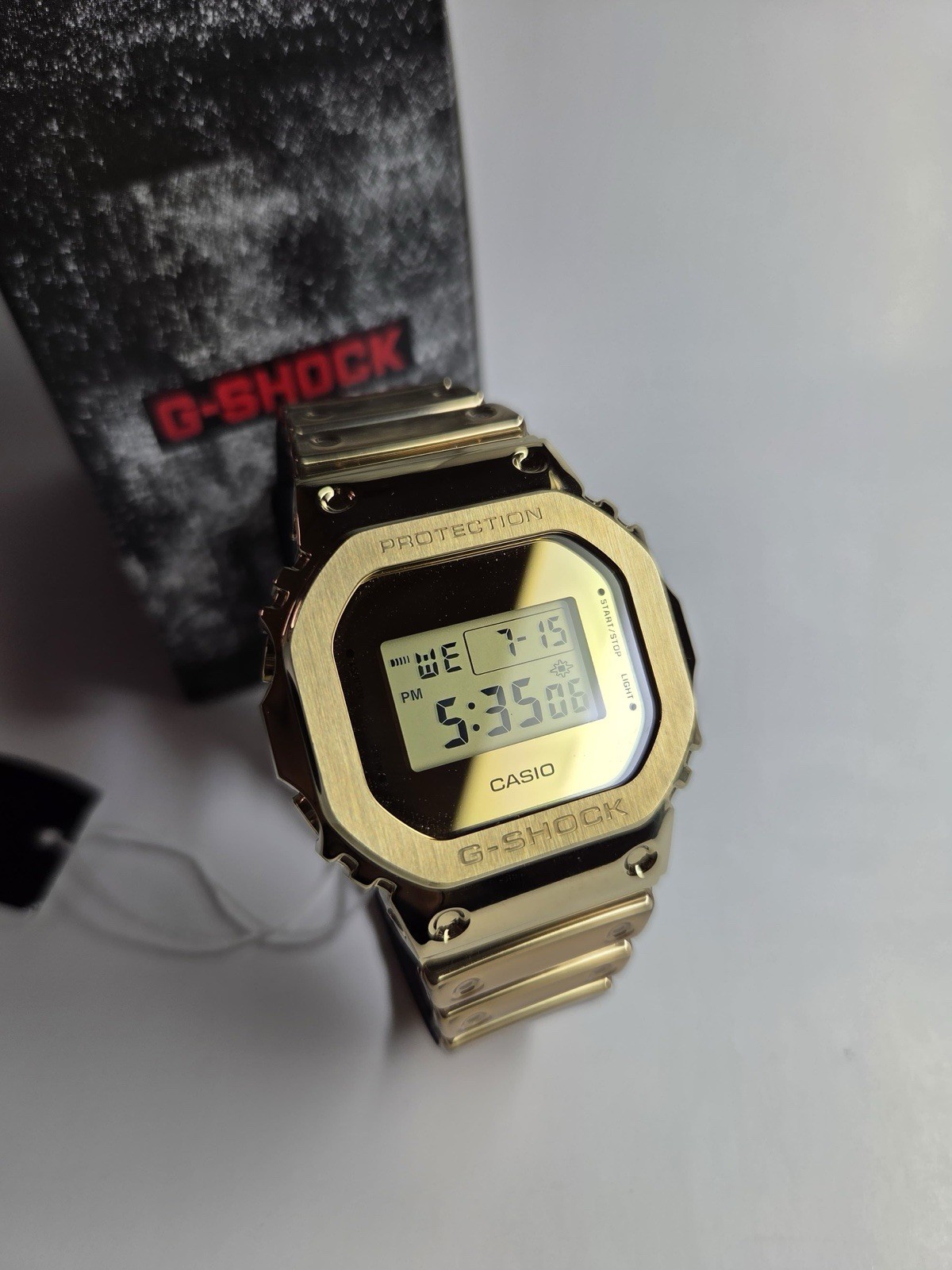 Casio G-Shock GM-5600YMG-9 Gold Metal G-Steel Digital Watch Brand New