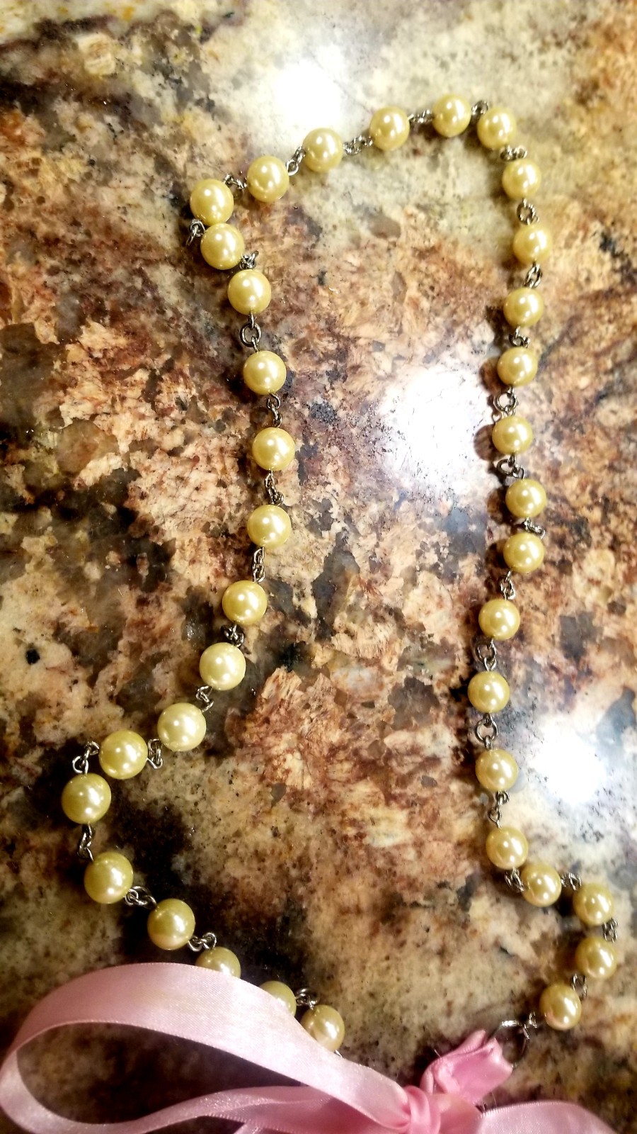 Strand of old fashioned 1960s Pearl’s with pink silk ribbon necklace/belt