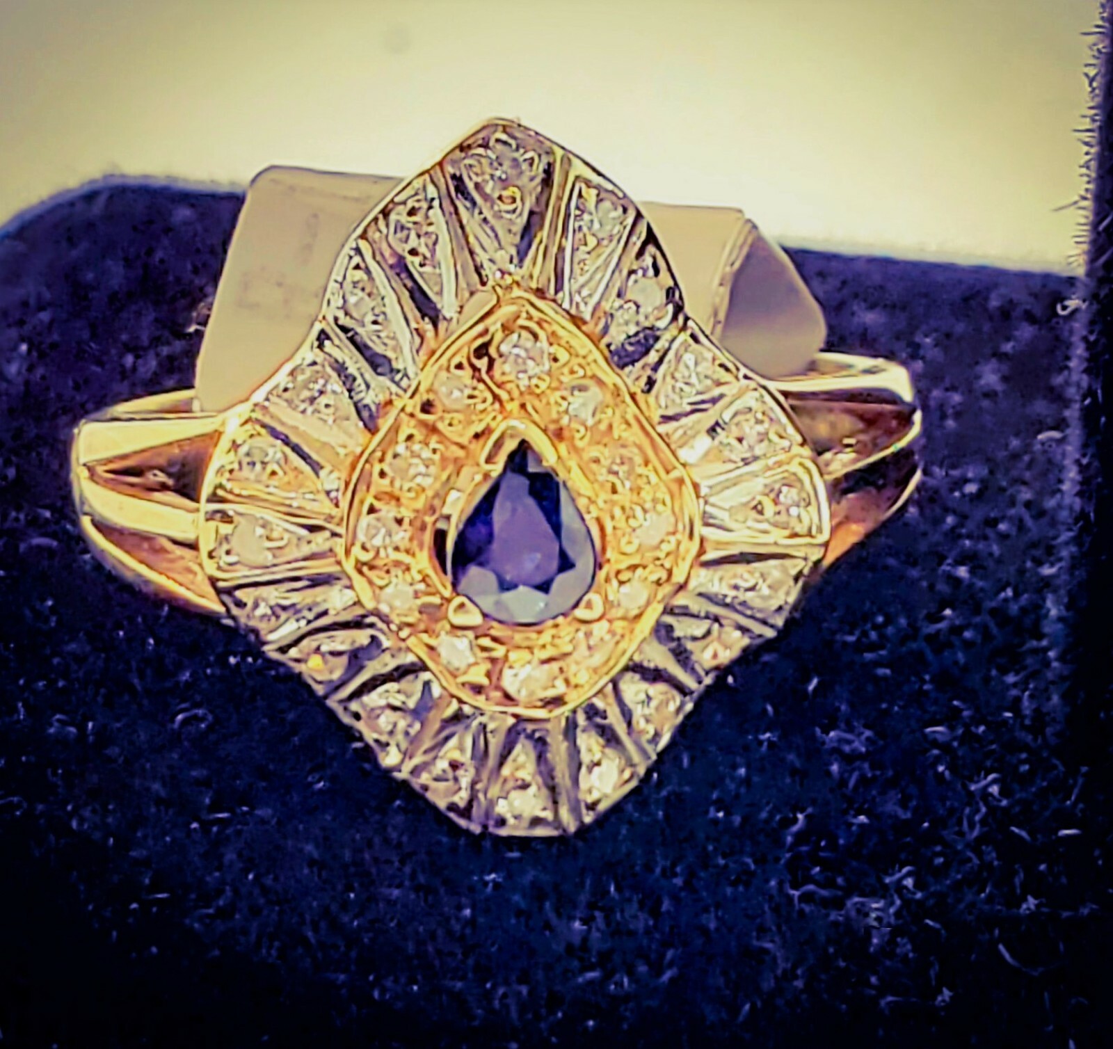 Wavering diamond (.35) and sapphire (.10) ring, 14 kt yellow gold 3.6gm
