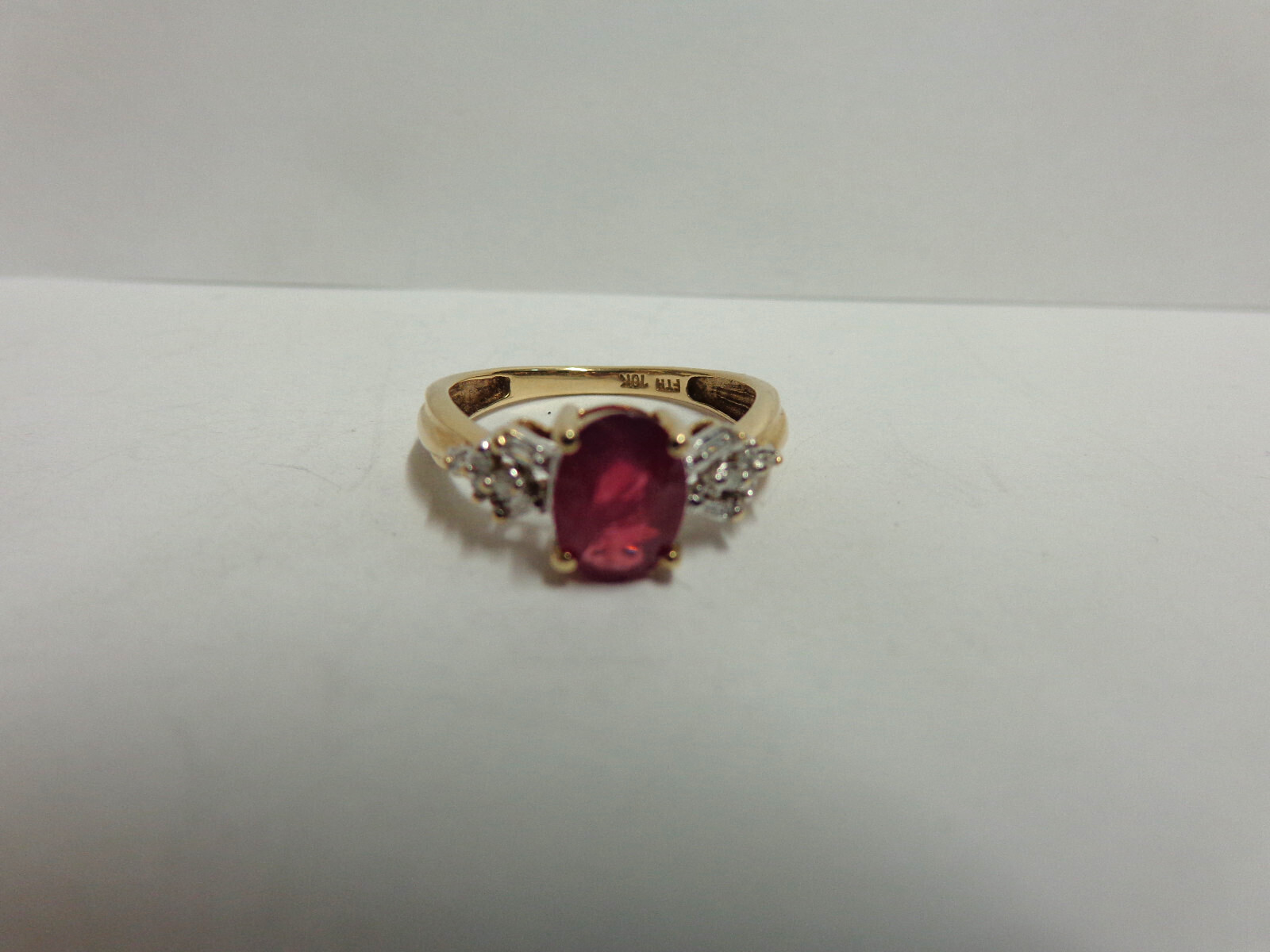 10kt yellow gold ruby/diamond ring sz 7 wgt 2.4 grams tcw 1.12 solitaire/accents