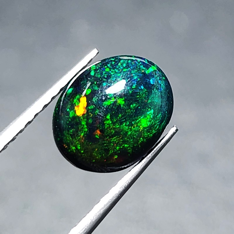Ethiopian Welo Black Opal AAA+ Oval Cabochon Strong Green Play Loose 1.20Ct Gem