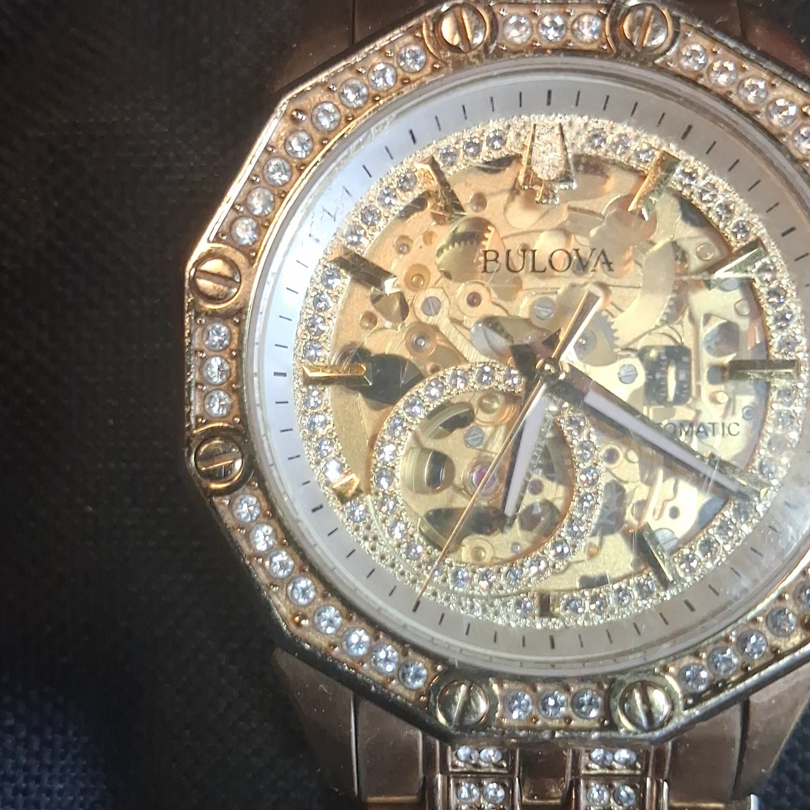 Bulova Mens Automatic Skeleton Dial Gold-Tone Bracelet Watch Crystal Bezel