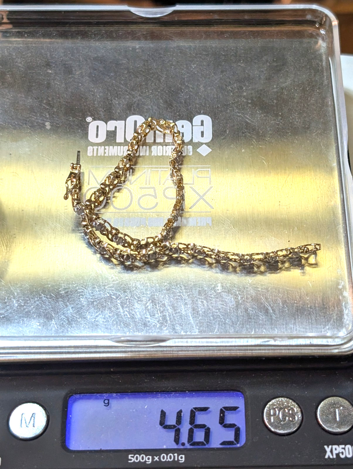 10K YELLOW GOLD DIAMOND TENNIS BRACELET 7.50 INCHES LONG & 6.50 GRAMS