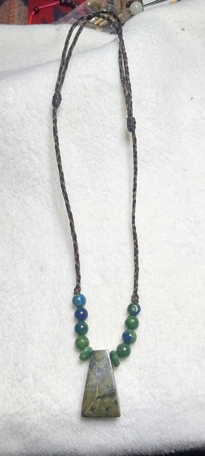 Axe on Serpentine stone hand braided adjustable Neckalce.