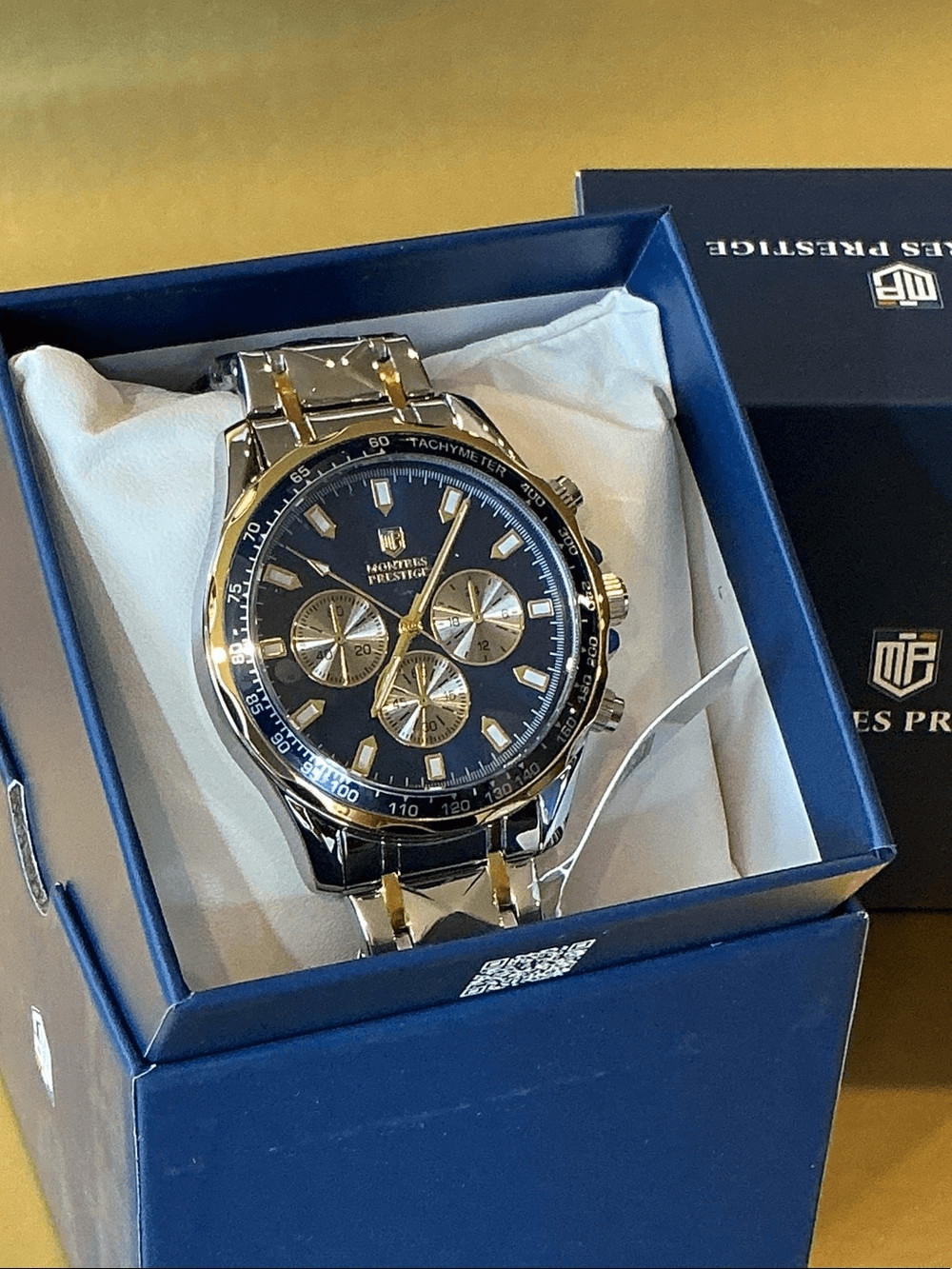 Invicta Two-Tone Gold and Silver Chronograph Watch with Black Dial Mpw-0345