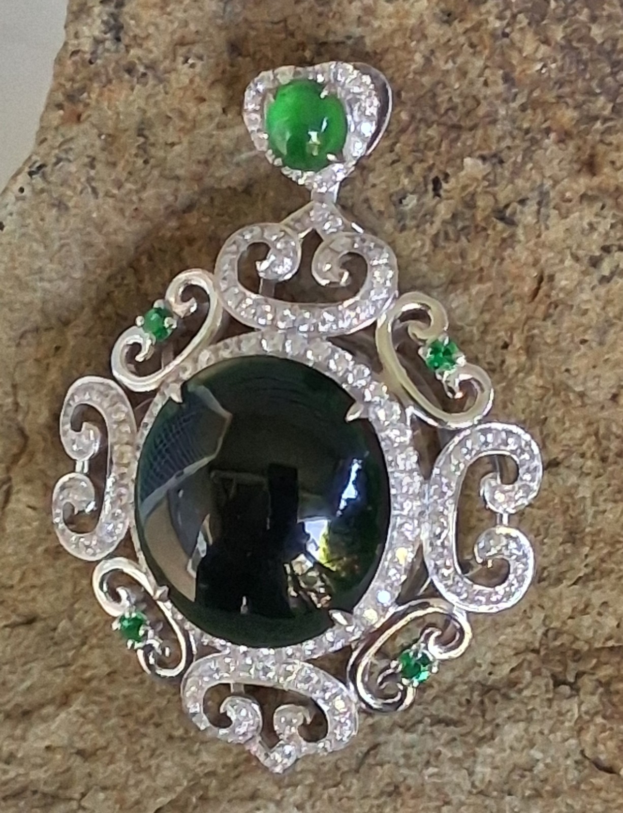 Silver Tone Ornate Scrollwork Oval Pendant Green Oval Cabochon & Accents