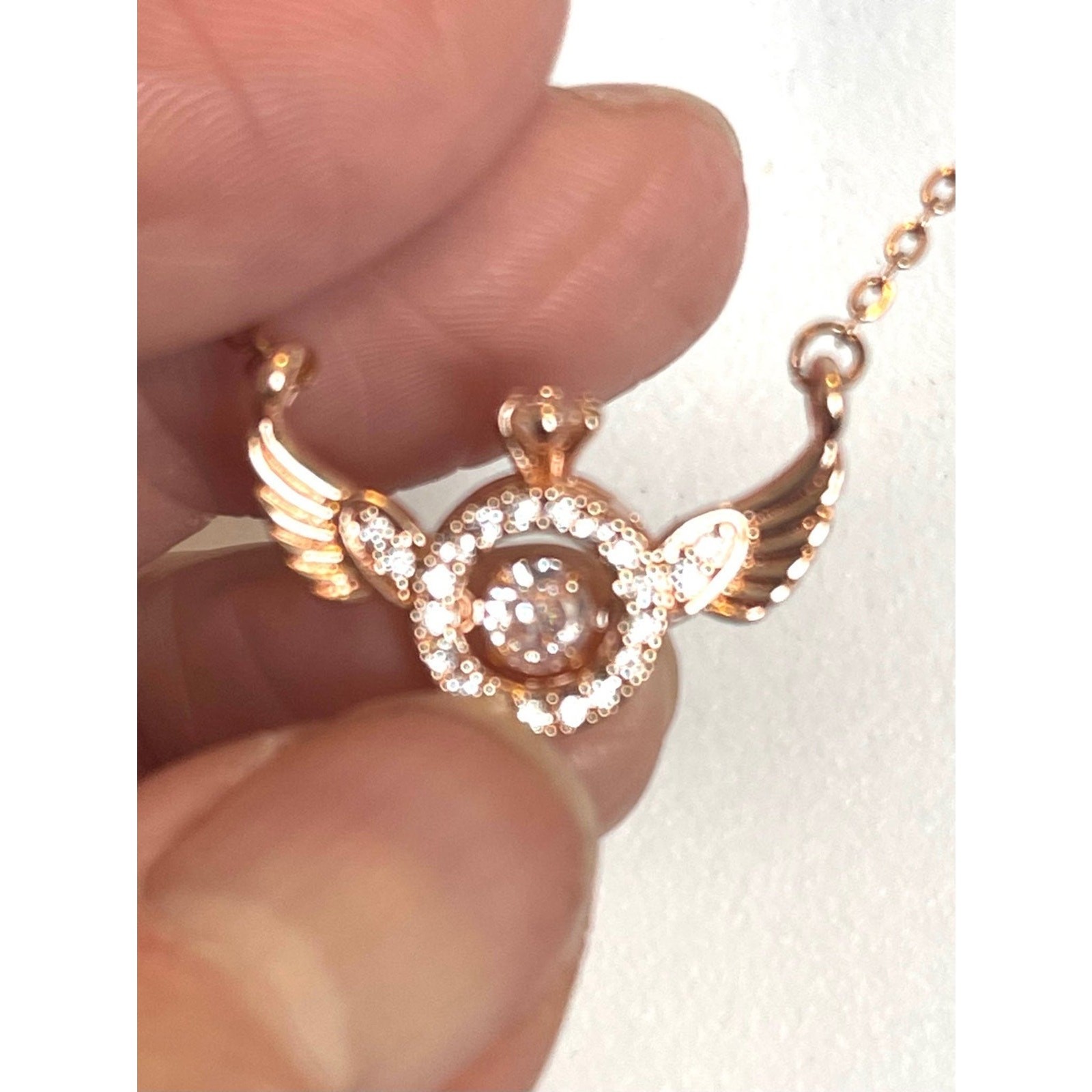 Rose Gold Over Stainless Angel Wing Trimbler Necklace, CZ’s Lobster Claw Clasp