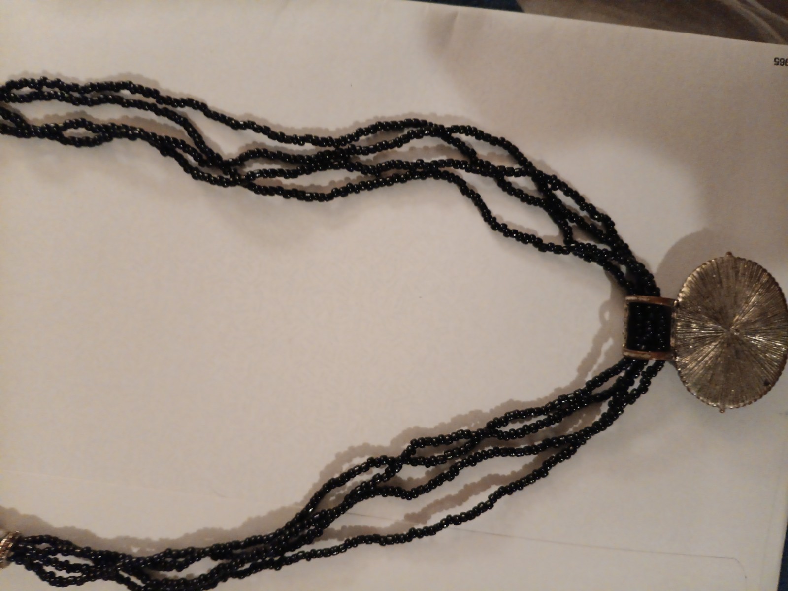 Black Seed Beads With Silver Tone & Black Sliding Pendant Necklace by Avenue