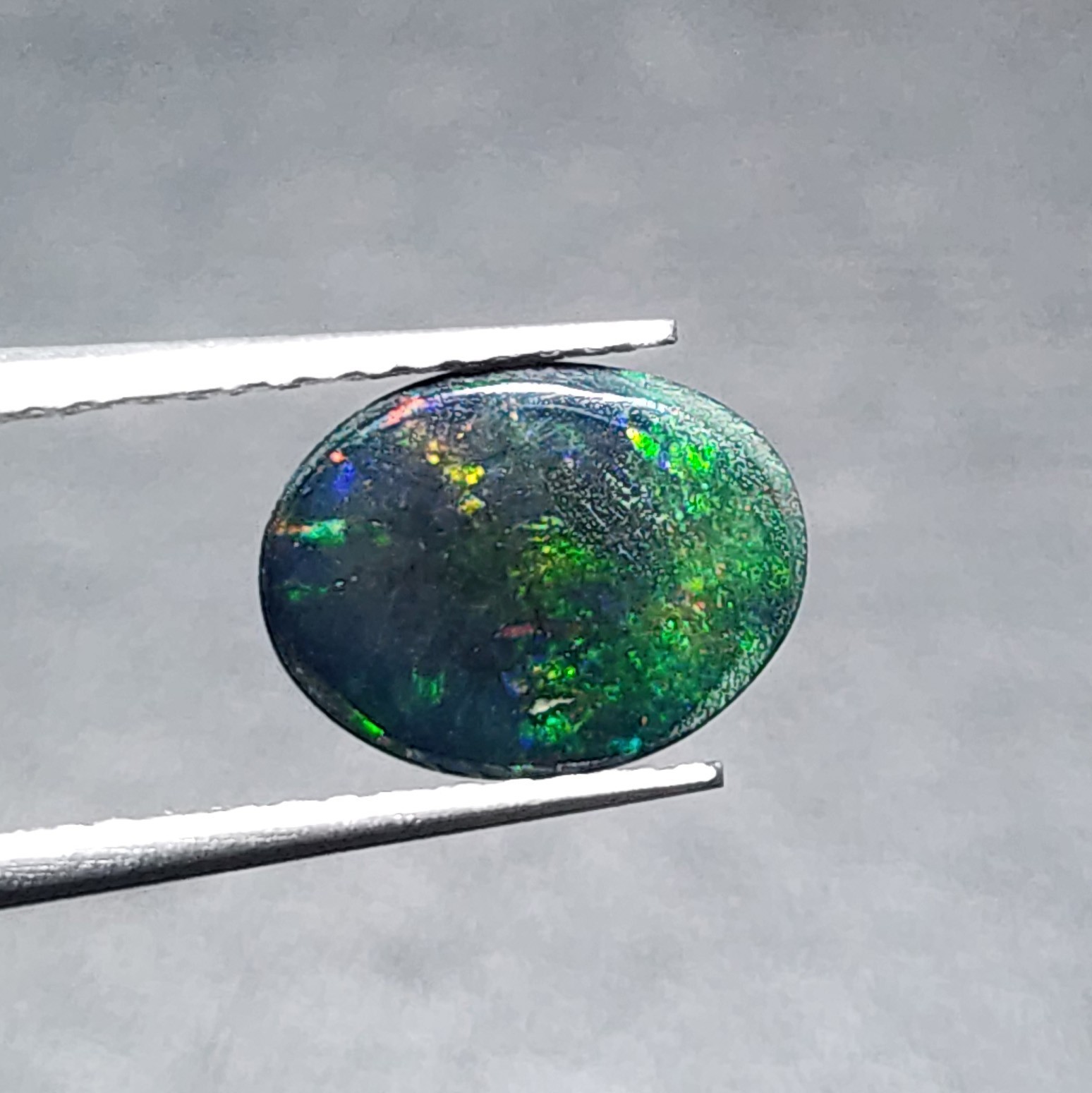 Natural Welo Black Opal Ethiopia Oval Cabochon Vivid Green Fire Gemstone 1.20Ct