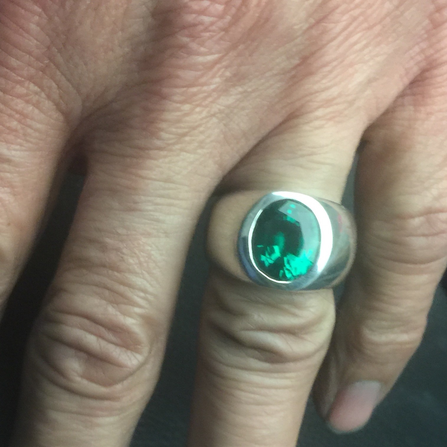 MJG STERLING SILVER RING. HEAVY. 12 x 10mm OVAL LAB EMERALD. SIZE 9.5