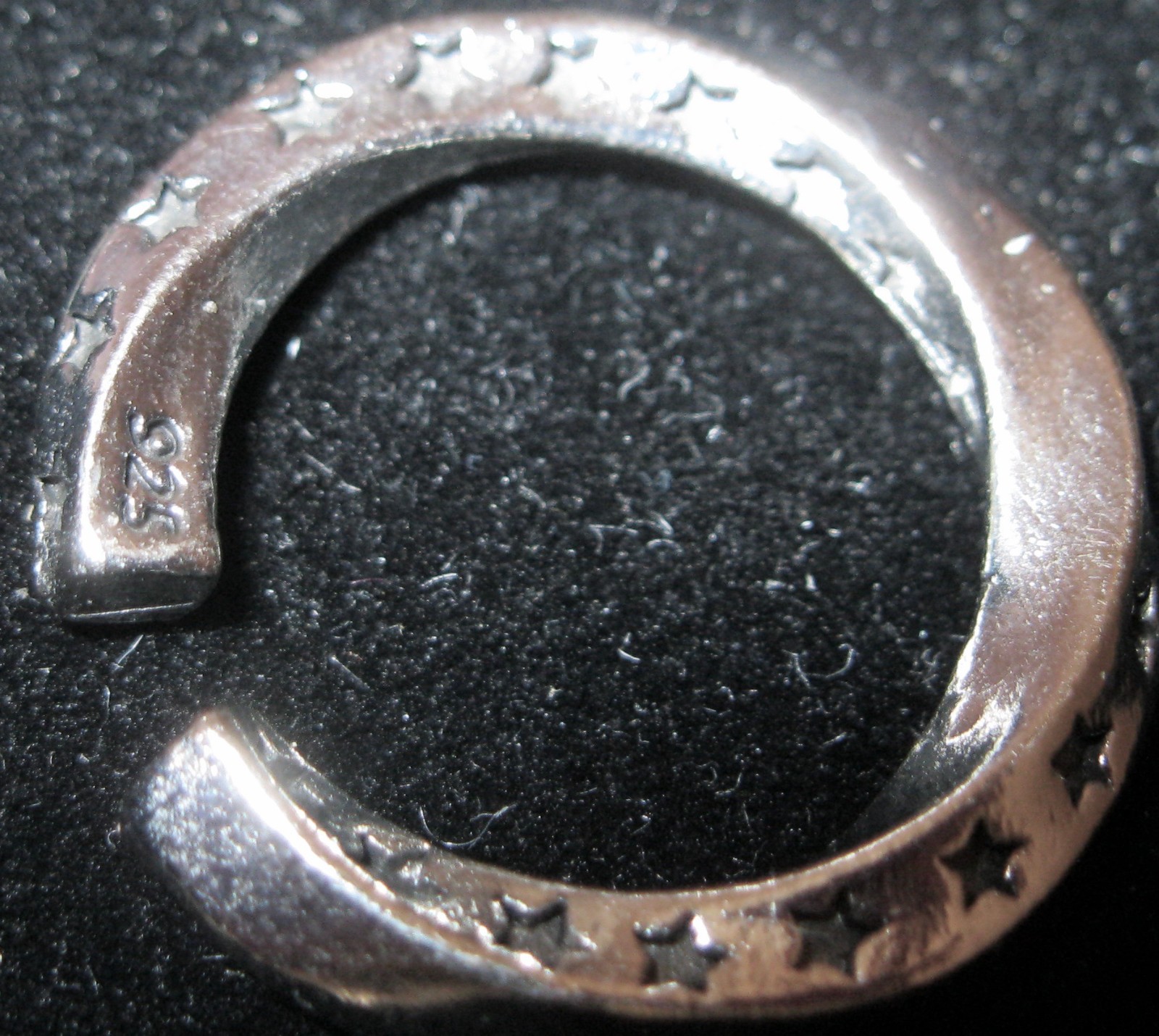 “BEAUTIFUL 925 STERLING SILVER EAR CUFF. STAMPED 925 AND LOADED WITH STARS”
