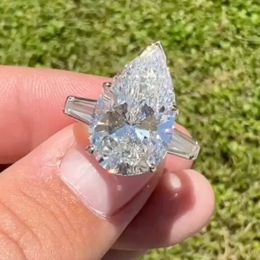 5.67 TCW Pear Cut Moissanite Three Stone Engagement Ring 14K White Gold Plated
