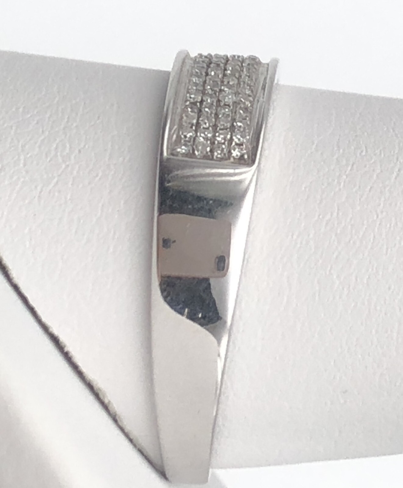 10k White Gold Band with 0.25cts micropave Diamonds Size: 11