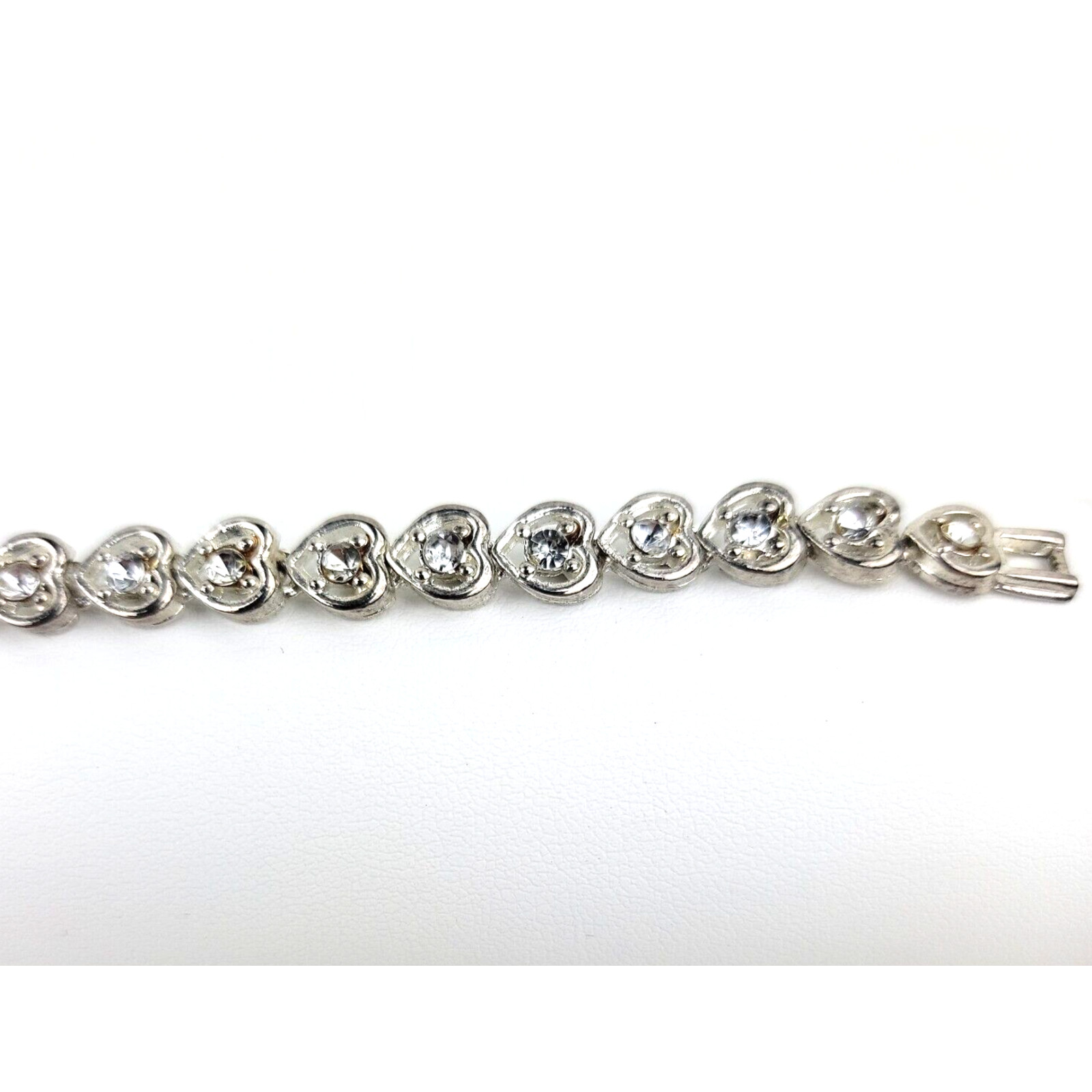 Heart Shaped Tennis Bracelet Silver Tone Link with Rhinestones Fold Over Clasp