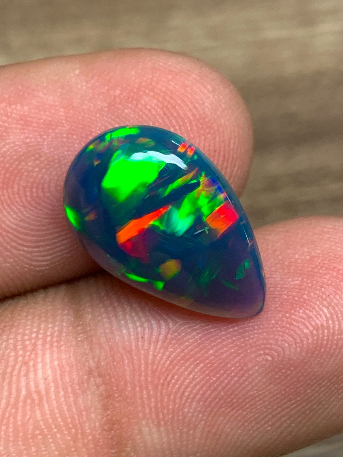 Ethiopian Opal Gemstone 4.65crt Pear Cabochon Black Welo Rainbow Flash Gemstone