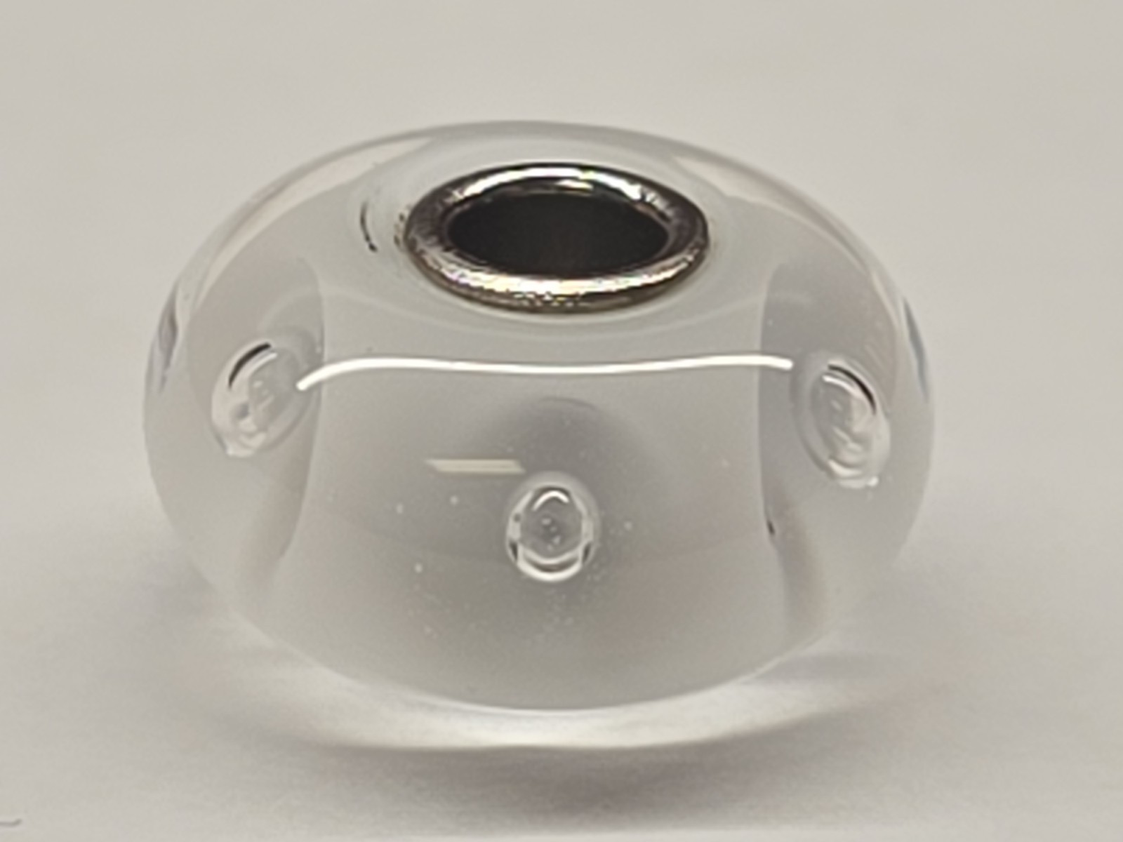 White Bubbles Glass Trollbeads TGLBE-10231. By Lise Aagaard. Retired In 2021.