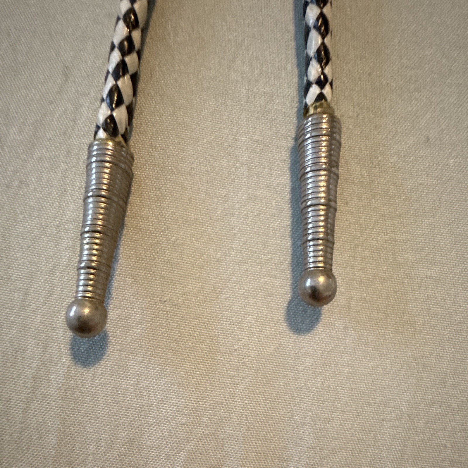 Men’s Western Arrowhead Bolo Tie Adjustable Black/White Braided Cord Metal Tips