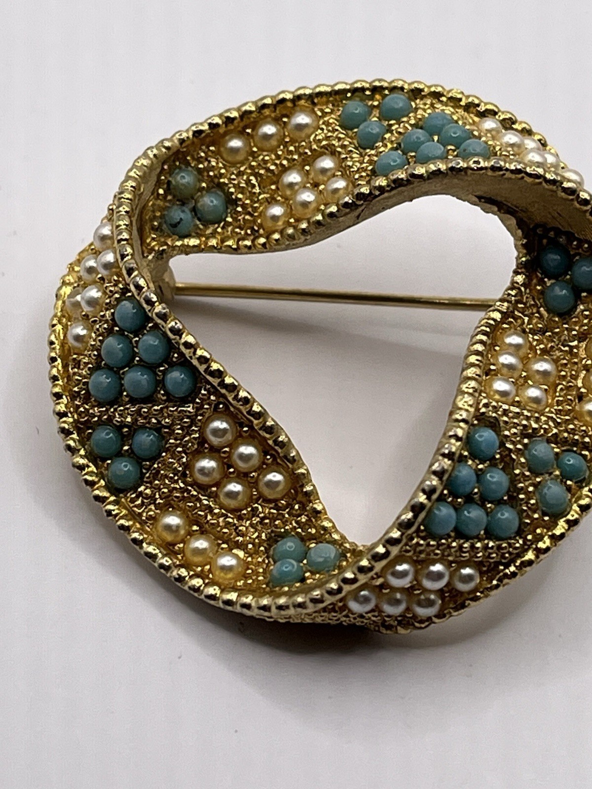 Vintage infinity ribbon brooch with turquoise beads Gold-tone Southwest READ