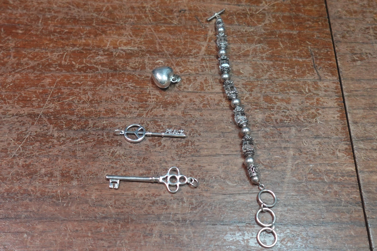 STERLING JEWELRY LOT OF 4-1BRACELET-3 PENDANTS- ALL MARKED .925 Lot 14