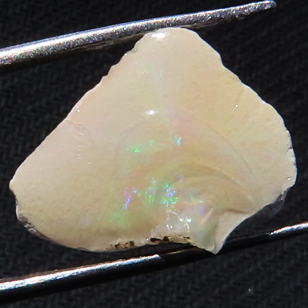 NATURAL PLAY OF COLOR ETHIOPIAN OPAL ROUGH GEMSTONE 3.95 Cts. (14x17x05 mm) M_08