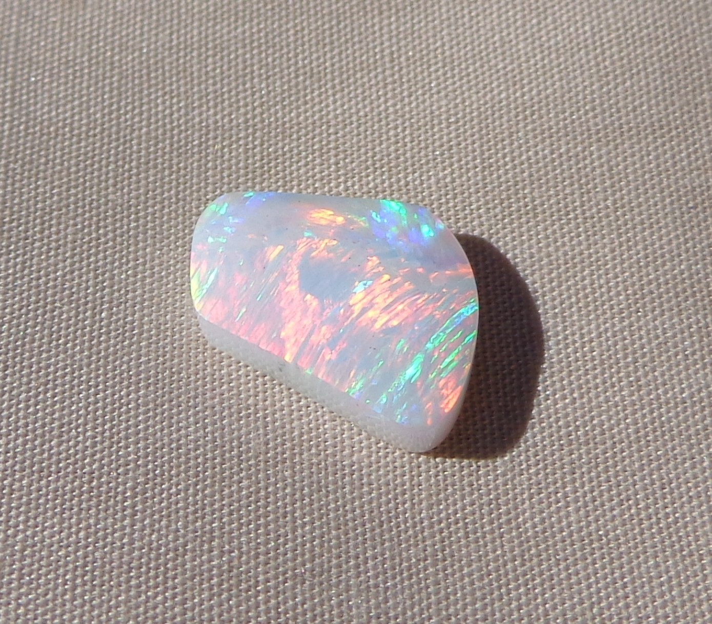 Spencer Idaho Opal Solid 9X15 mm with Unique Pattern and Red, Green, & Gold Fire
