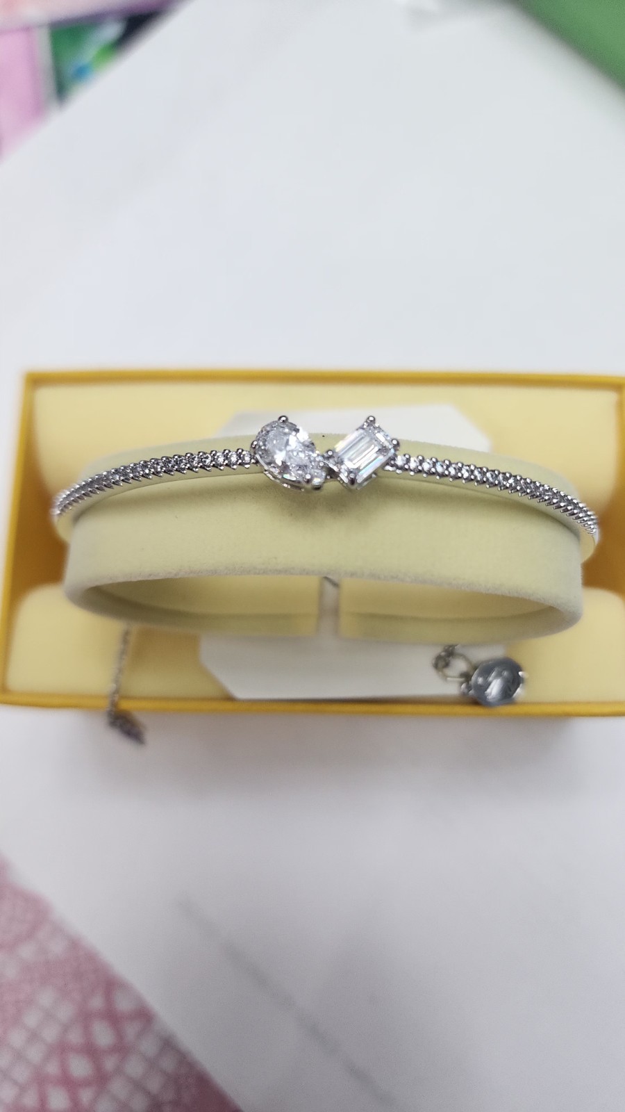 Swarovski Mesmera Bangle Bracelet, Clear Mixed-Cut Stones in a Rhodium Finished