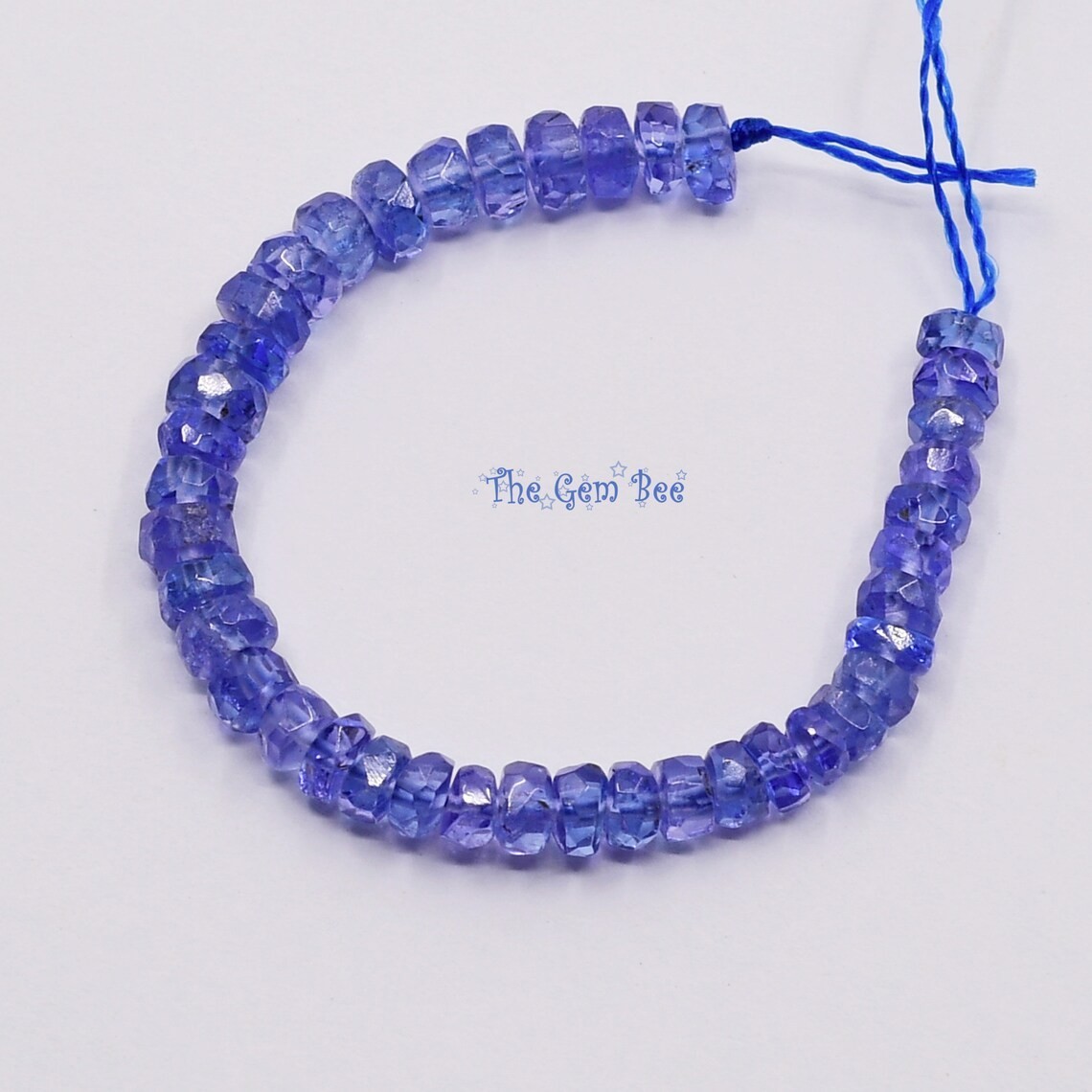 3.3mm-3.5mm Gem Grade Periwinkle Tanzanite Faceted Rondelle Bead 3 inch strand