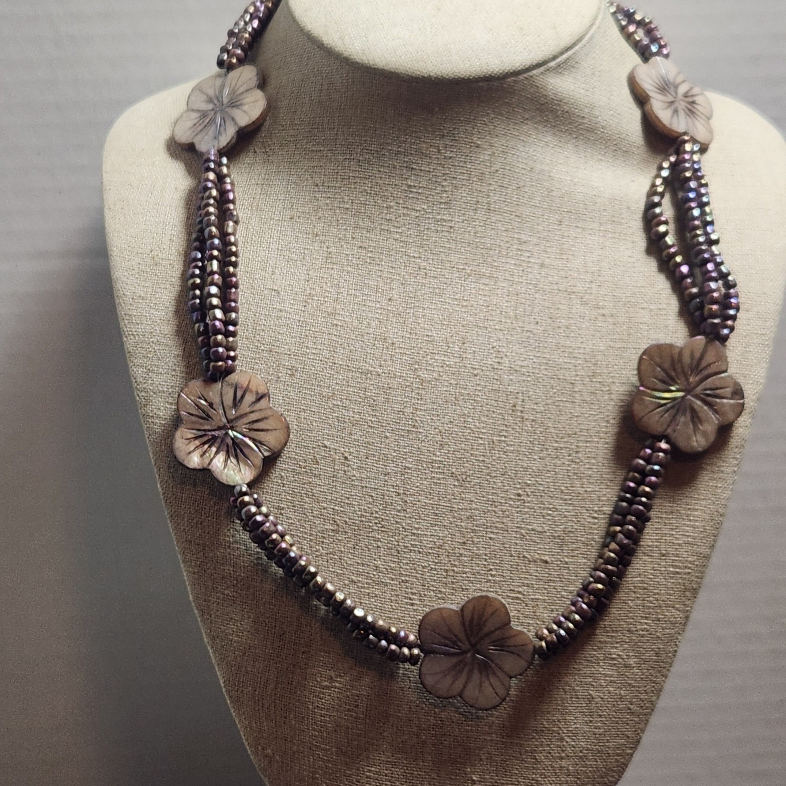 Iridescent Mauve Multi Strand Seed Bead Necklace Carved Shell Flower Toggle 21in