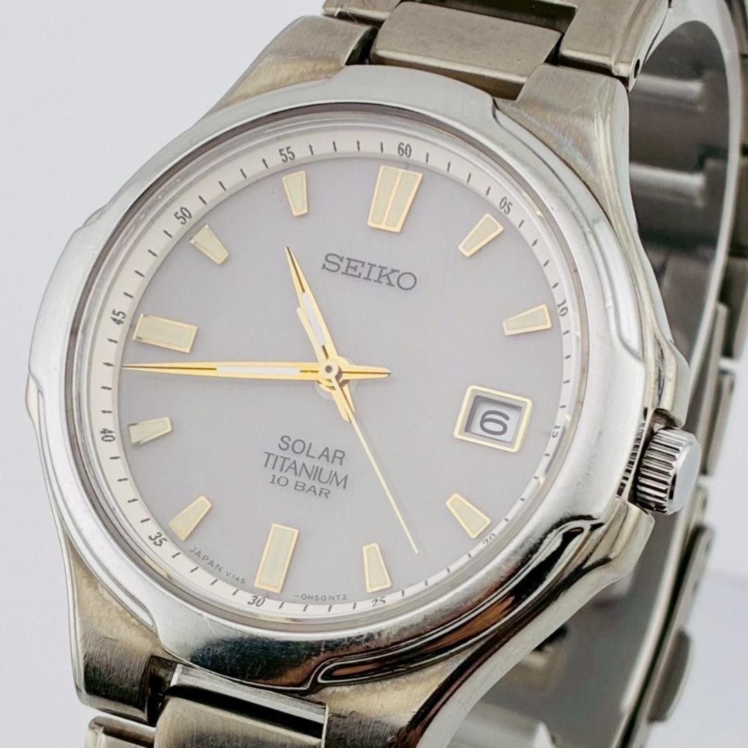 SEIKO Men’s Watch, Date Display, Original Strap, Solar Powered, Titanium