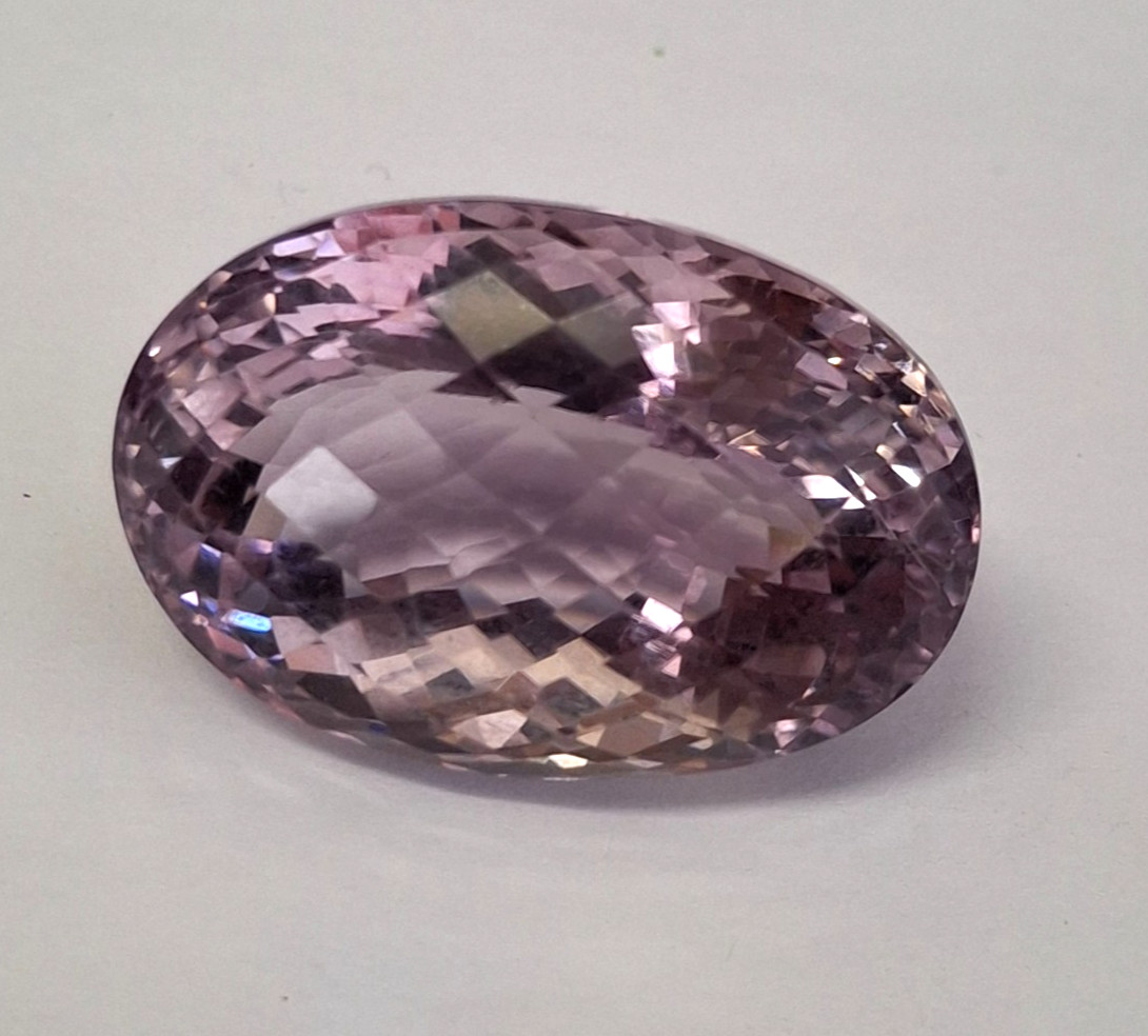 Large 84 carat Rose Cut Amethyst with a blur of facets plus GLI Certificate