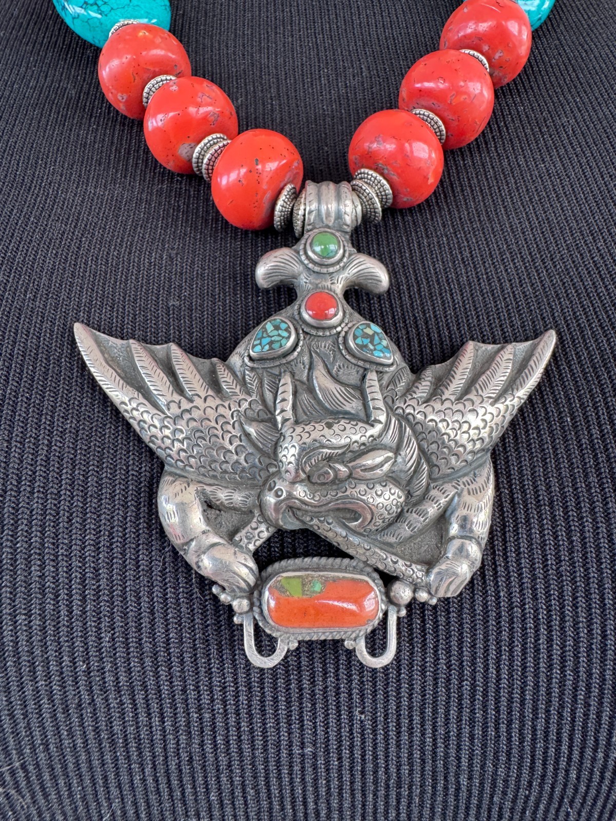 Silver Garuda pendant strung with natural coral and turquoise