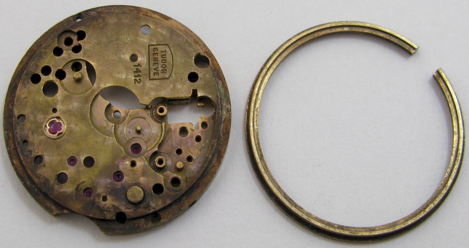 Tudor 1412 watch movement part: jeweled main plate #100
