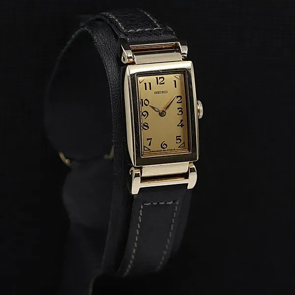 Working condition, excellent condition. Seiko 2E20-5510 Quartz, gold dial, recta