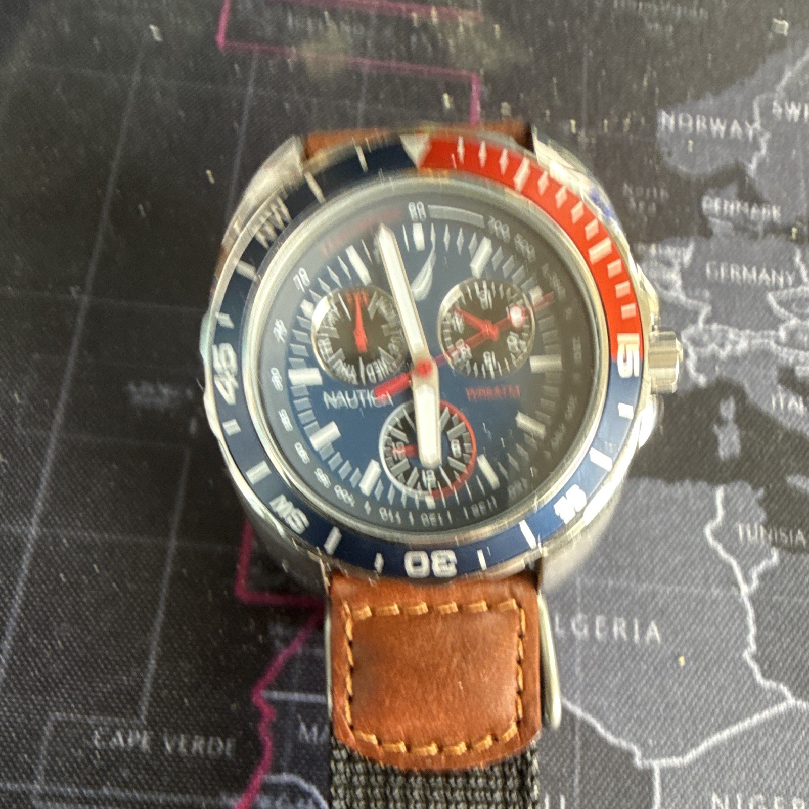 Nautica Men’s Quartz Sport Chronograph Tachymeter Blue Dial Red/Blue Bezel